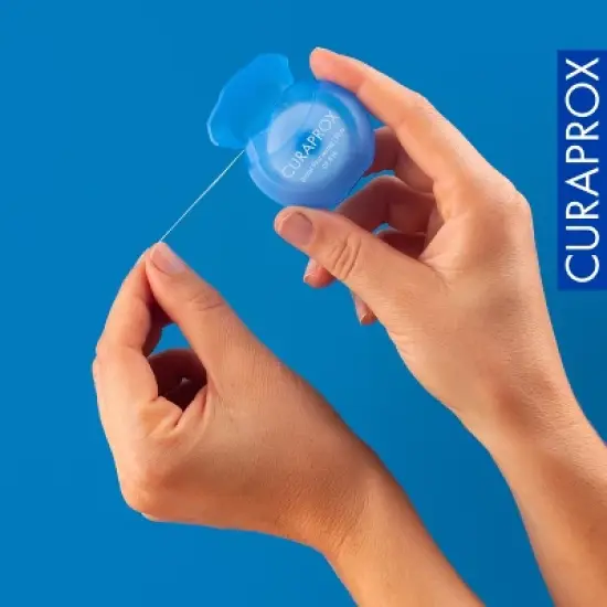Curaprox DF 834 Dental Floss, Waxed Mint Flavour, 50m for Tight Interdental Spaces image {3}