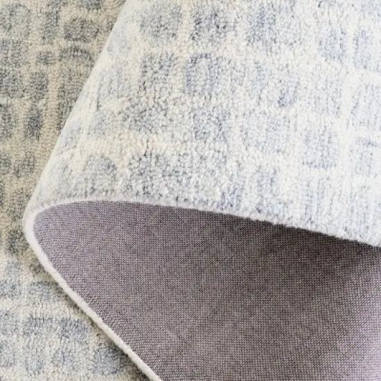 Ebony EBN920 Handmade Tufted Rug - Safavieh image {4}