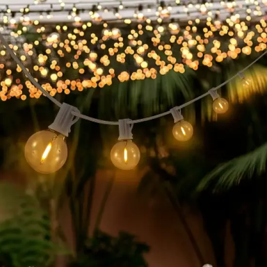 JONATHAN Y 25-Light Indoor/Outdoor 25 ft. Contemporary Rustic Incandescent G40 Bistro Globe Bulb String Lights image {1}