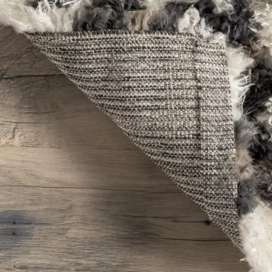 Kenina Leopard Shag Area Rug image {6}