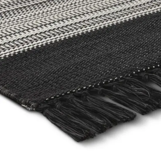 7' x 10' Outdoor Rug Striped Fringe Black - Project 62&trade; image {1}