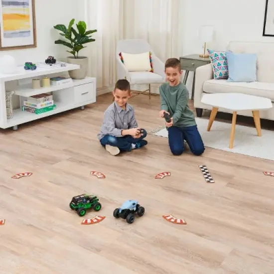 Monster Jam Official Grave Digger vs Megalodon Racing Rivals Remote Control Monster Trucks - 1:24 scale - 2 pk image {5}