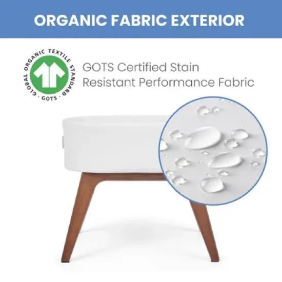 Delta Children Aero Bassinet Modern Portable Baby Crib with Solid Wood Legs, Mattress Pad and Fitted Sheet - White image {3}