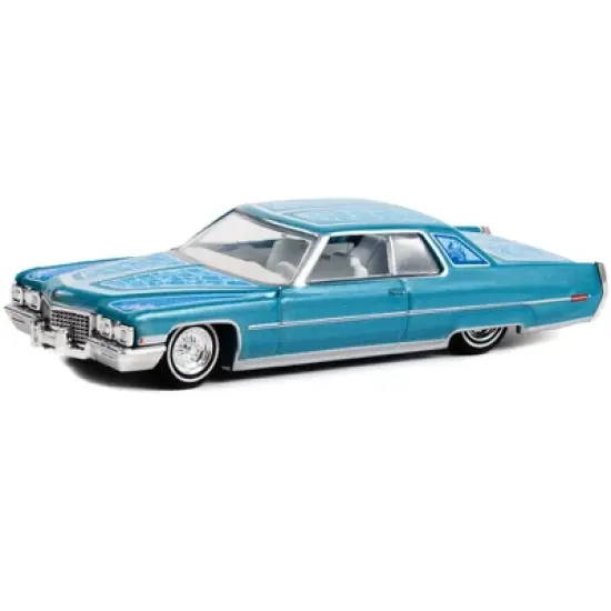 1972 Cadillac Coupe DeVille Custom Light Blue Metallic with White Interior and Graphics 1/64 Diecast Model Car by Greenlight image {1}
