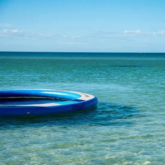 WateRaft Floating Inflatable Lounge Dock with Removable Mesh Net Center, Built-In D Rings for Anchoring, Air Pump, and Travel Bag for Up To 6 Adults image {4}