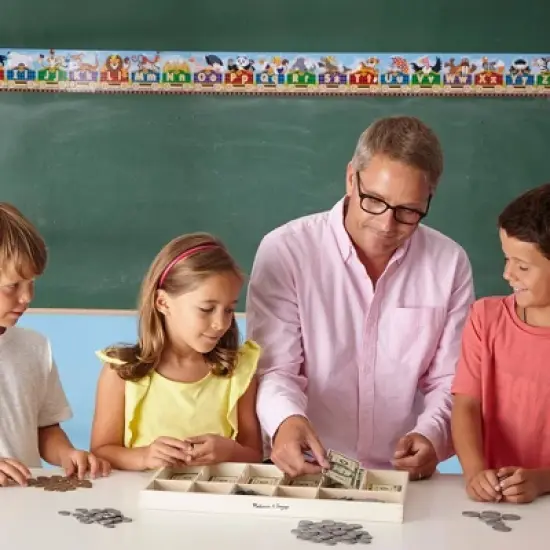 Melissa & Doug Play Money Set - Educational Toy With Paper Bills and Plastic Coins (50 of each denomination) and Wooden Cash Drawer for Storage image {1}