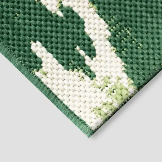 7' x 10' Peacock Ikat Outdoor Rug Green - Opalhouse&trade; image {1}