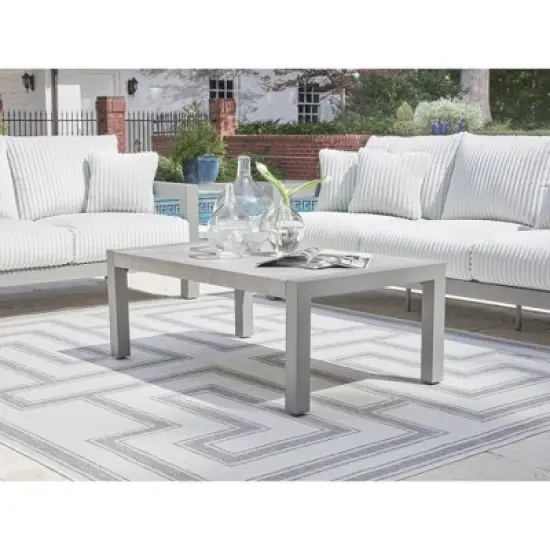 Signature Design by Ashley Agoda Pearl Outdoor Coffee Table - Weather Resistant Aluminum Frame with Gray Stone Top image {1}