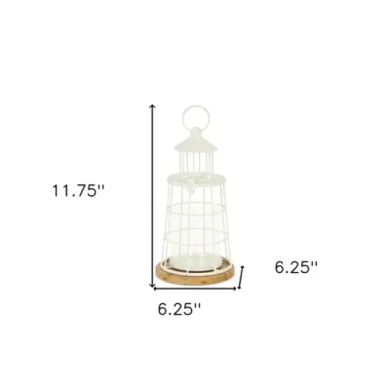 HomeRoots 12" White And Natural Metal And Wood Lighthouse Tabletop Lantern Candle Holder image {2}