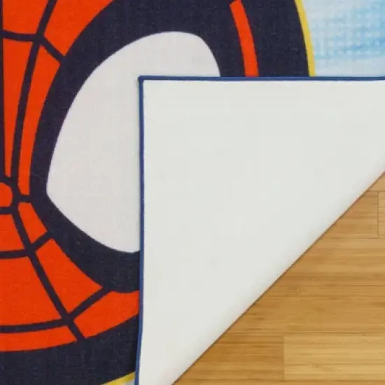 Spidey Circle 54"x78" Area Rug Blue image {3}