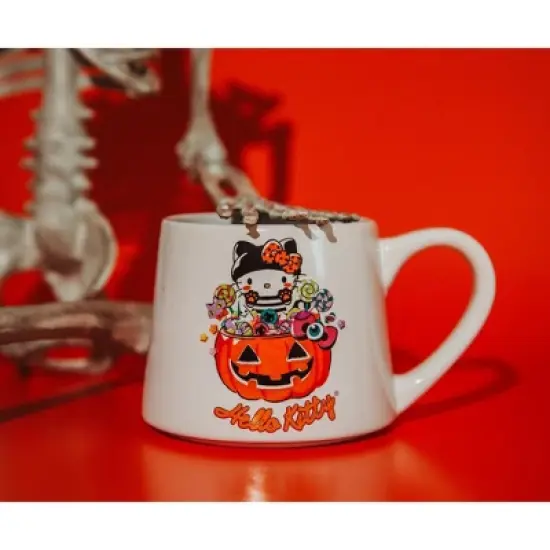 Silver Buffalo Sanrio Hello Kitty Pumpkin Candy Burglar Tapered Pottery Mug | Holds 14 Ounces image {6}