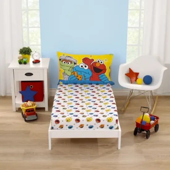 Sesame Street Come and Play Blue, Green, Red and Yellow 2 Piece Toddler Sheet Set - Fitted Bottom Sheet and Reversible Pillowcase image {6}
