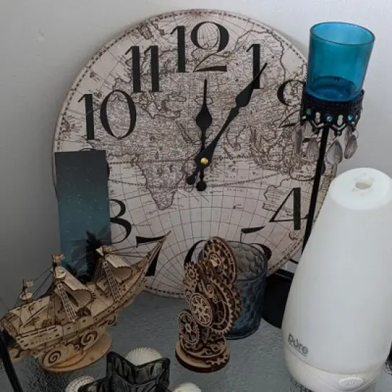 Northlight 12" Ivory and Black Battery Operated Round Wall Clock with World Globe Design image {4}