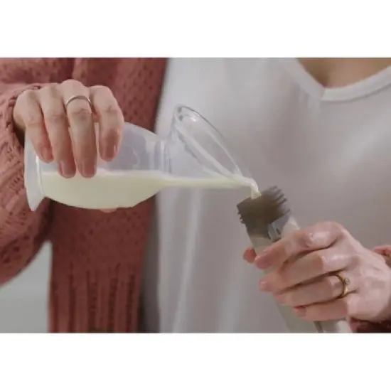 Haakaa Breast Pump with Suction Base and White Flower Stopper - 5oz image {4}