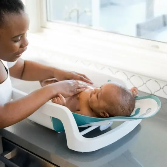 The First Years Sure Comfort 4-in-1 Reclining Newborn to Toddler Baby Bathtub - White image {5}