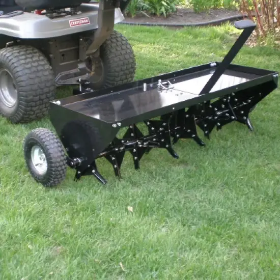 Yard Tuff 48 Inch Steel Tow Behind Plug Aerator with Pneumatic Tires, 32 Coring Plugs, and Universal Hitch For Lawn Mowers, Garden Tractors, and ATVs image {1}