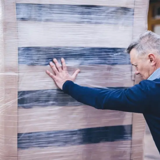 PSBM 1 Roll 19.7 in. x 5000 Ft. x 76 Gauge Clear Cast Hand Machine Stretch Wrap image {8}